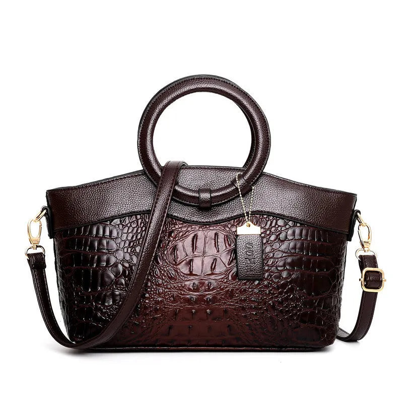 Fabric ladies handbag in multiple colours showing zipper compartment and internal organisation pockets