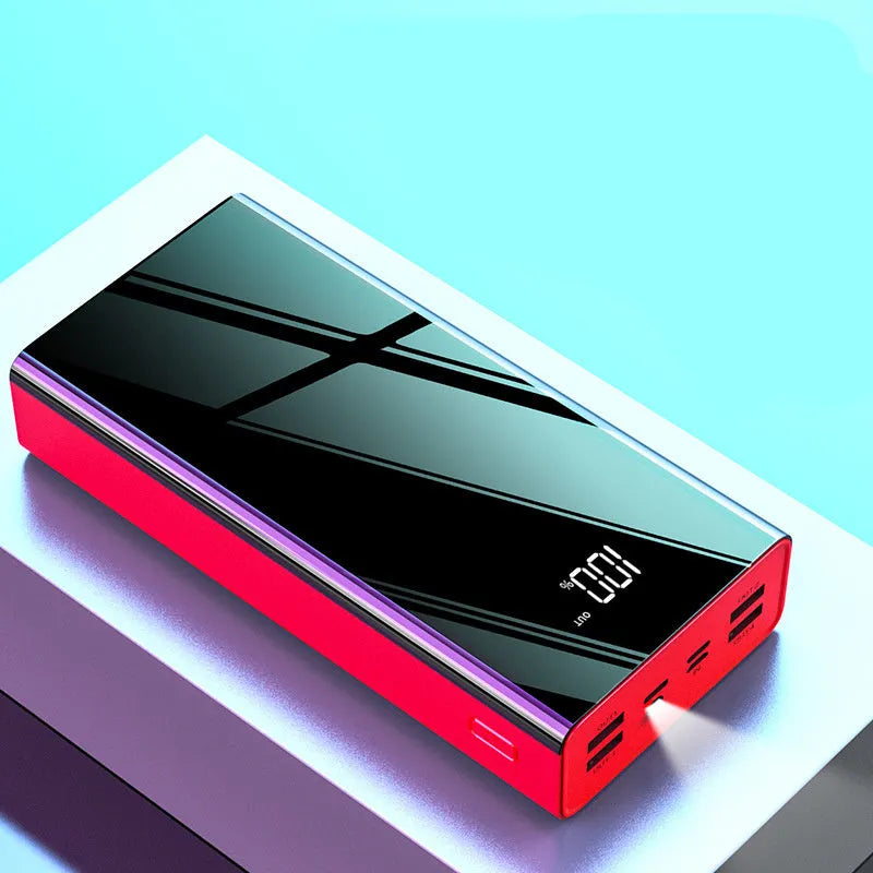 Large black or red 40000 mAh power bank with LCD display showing charge percentage.