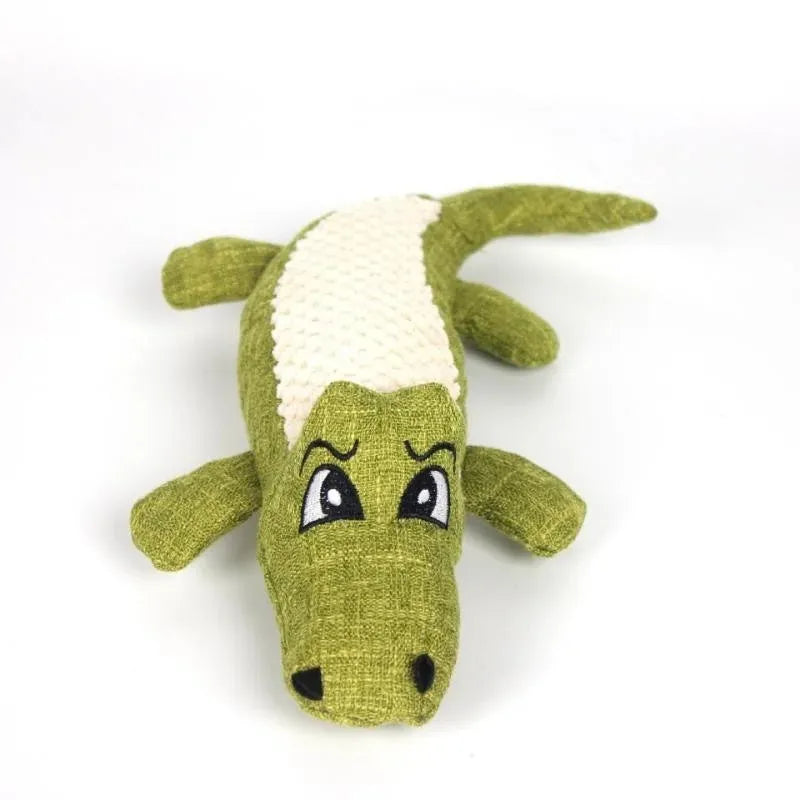 Blue, green, and red corn cob shaped plush dog toy with a textured surface on a white background.