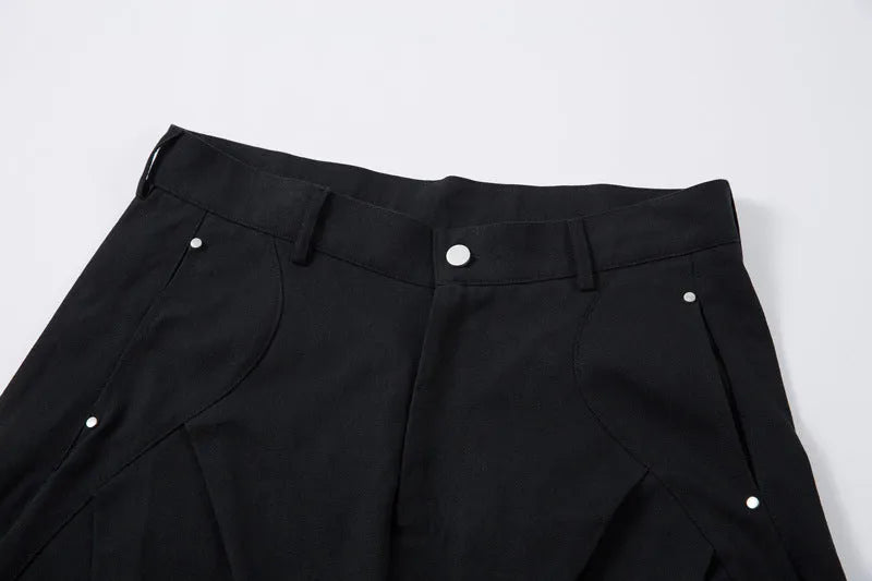 Men's black pleated machete casual trousers with loose-fitting wide-leg design and cotton fabric