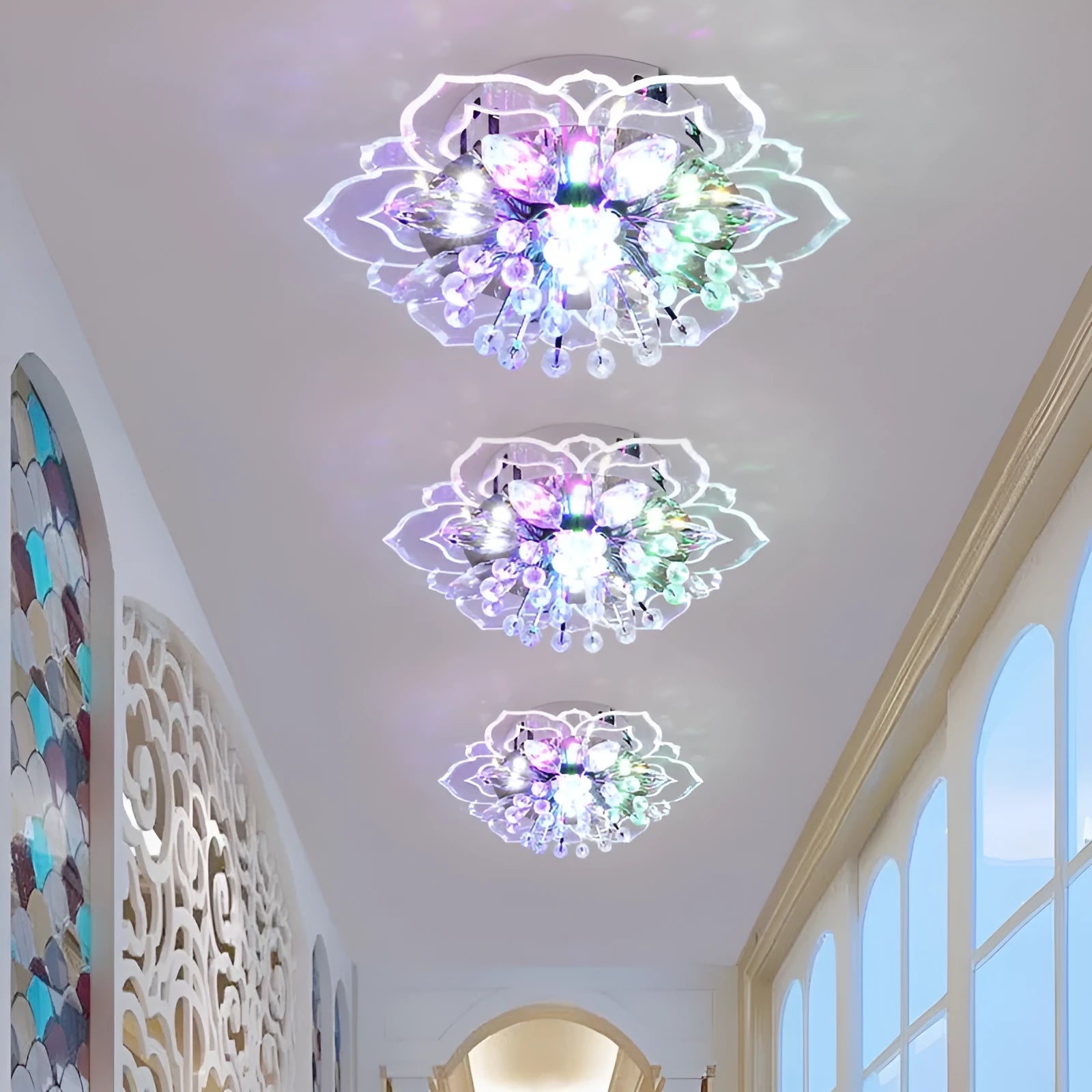 Small modern crystal ceiling lamp with flower-shaped shade in crystal, acrylic, and stainless steel materials