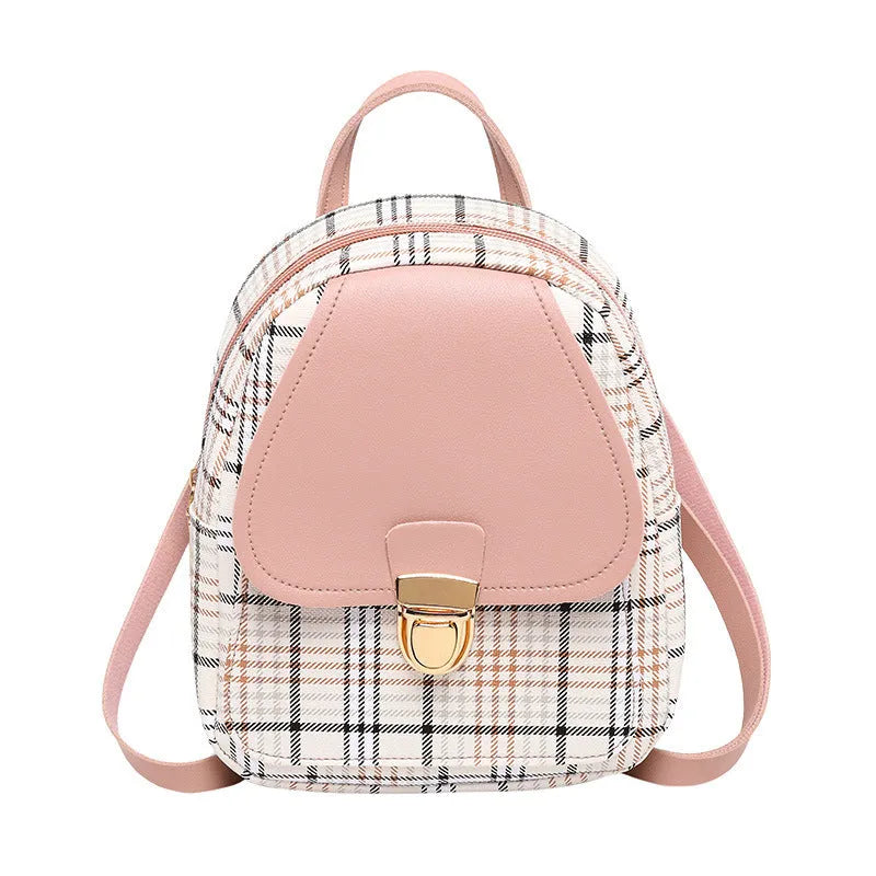 Diagonal shoulder phone bag in PU material showing adjustable strap and handheld carry option