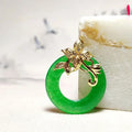 Quartz rock jade pendant necklace with emerald inlay on gold chain