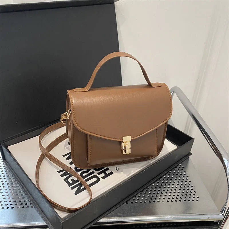 Retro messenger bag in horizontal square shape with sandwich pocket design in choice of four colours