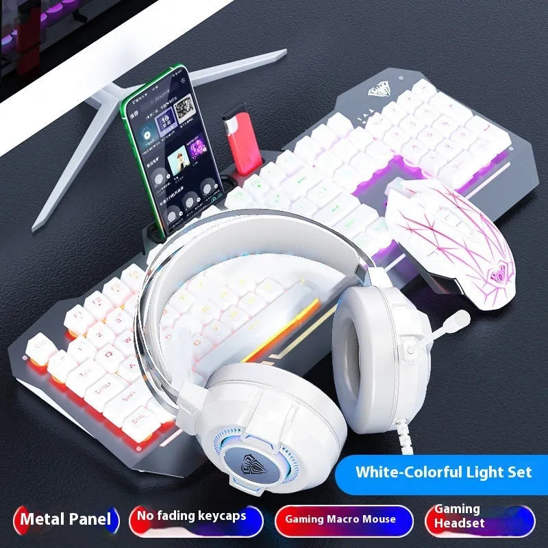 Metal mechanical keyboard bundle with gaming mouse, headset, and optional mouse pad on a desk.