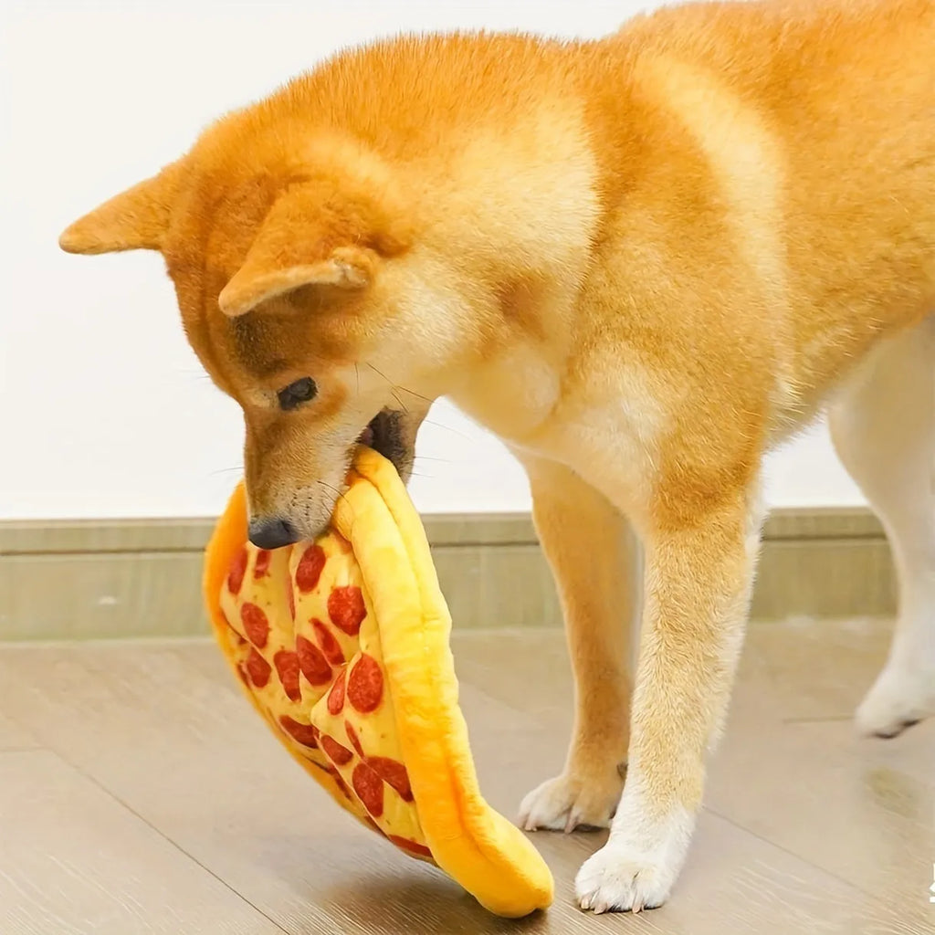 Yellow pizza slice dog chewing toy with squeaker made from teddy fabric