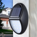 Black rectangular solar-powered LED wall light with automatic sensor for outdoor use.
