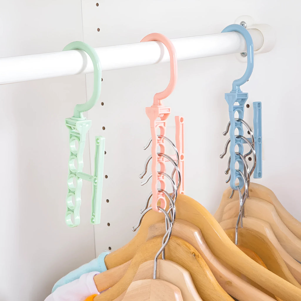 Blue revolving wardrobe hanger with five branches and folding handle for clothing organisation