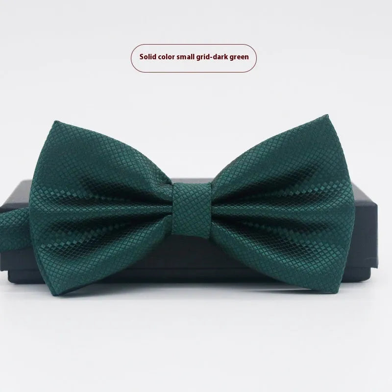 Men's flat head solid colour bow tie in polyester, showing 12cm by 6cm size on a background.