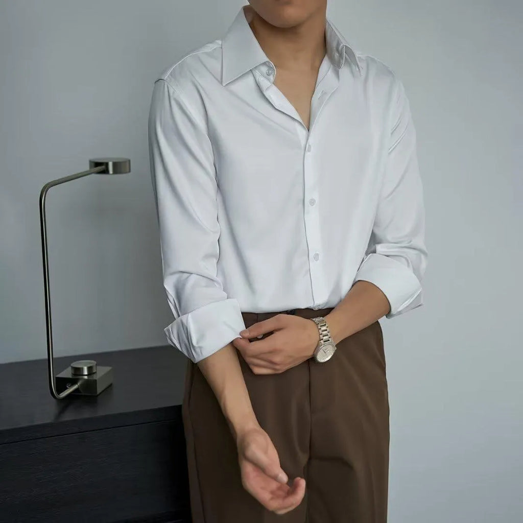 Man wearing a black loose-fit long sleeve cardigan shirt with a V-neck in Korean Japanese style.