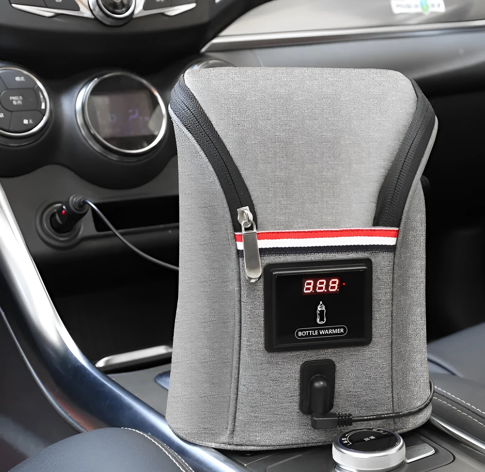 Grey Oxford cloth portable baby bottle warmer bag for car use with 12V charger and temperature display.