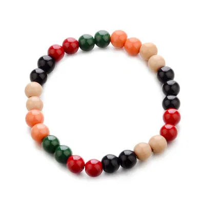 Natural stone beaded bracelet with ethnic design showing lava beads for essential oils