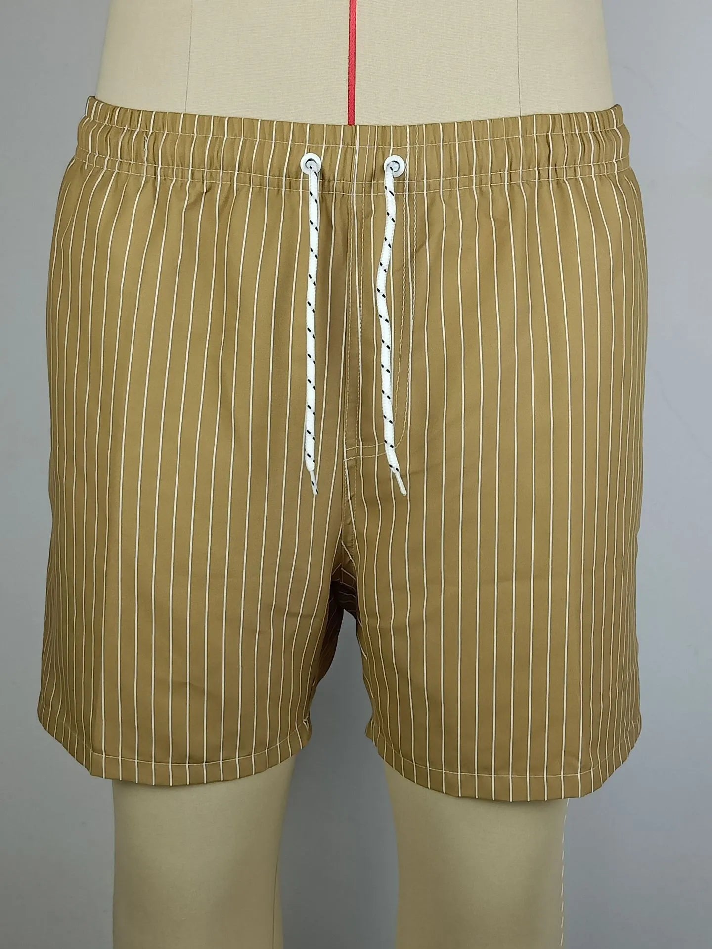 Polyester fibre striped beach shorts in navy blue, grey, khaki, or light blue colours
