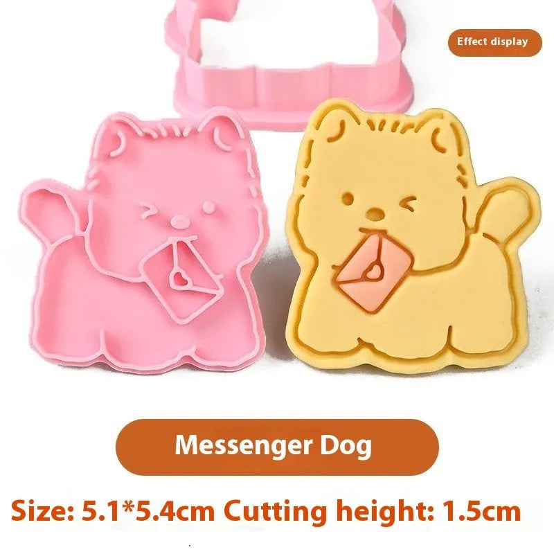 Three dimensional plastic biscuit mold showing puppy head and birthday hat designs