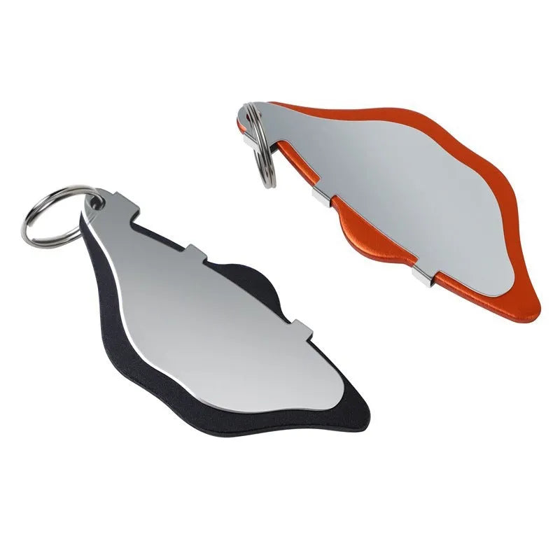 Black and orange metal mountain bike disc brake linings with adjustment flap for brake maintenance
