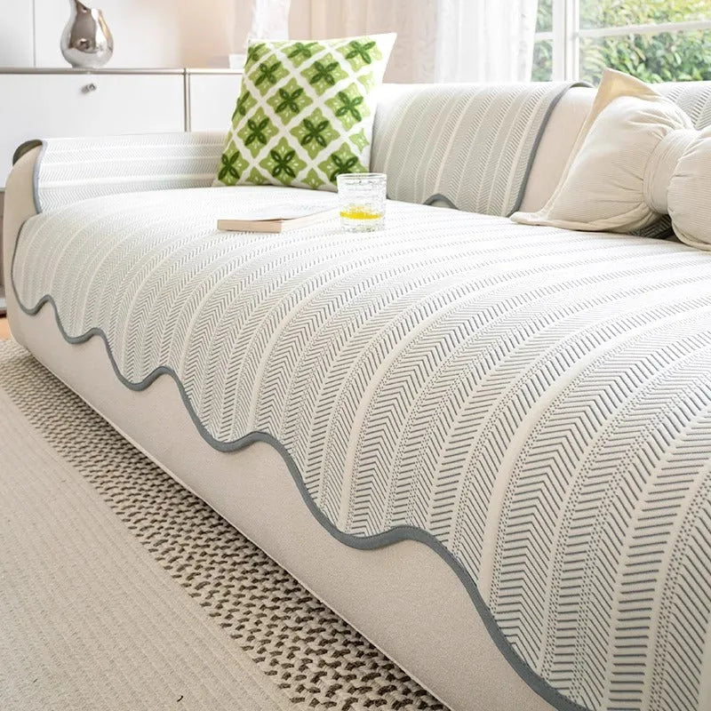 Ice silk sofa cover with non-slip design in jelly green colour on a three-seater sofa