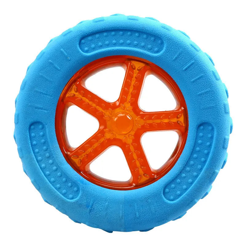 Set of three floating TPR dog toys: a squeaky ball, barbell, and tyre for water fetch.