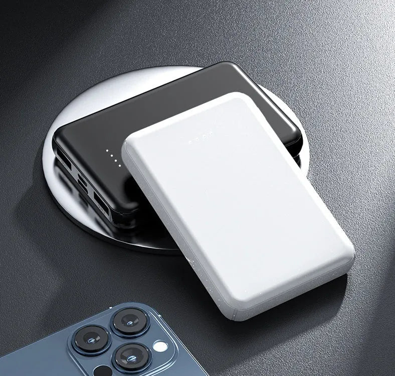 Black universal USB power bank for electric heating vests showing compact size.