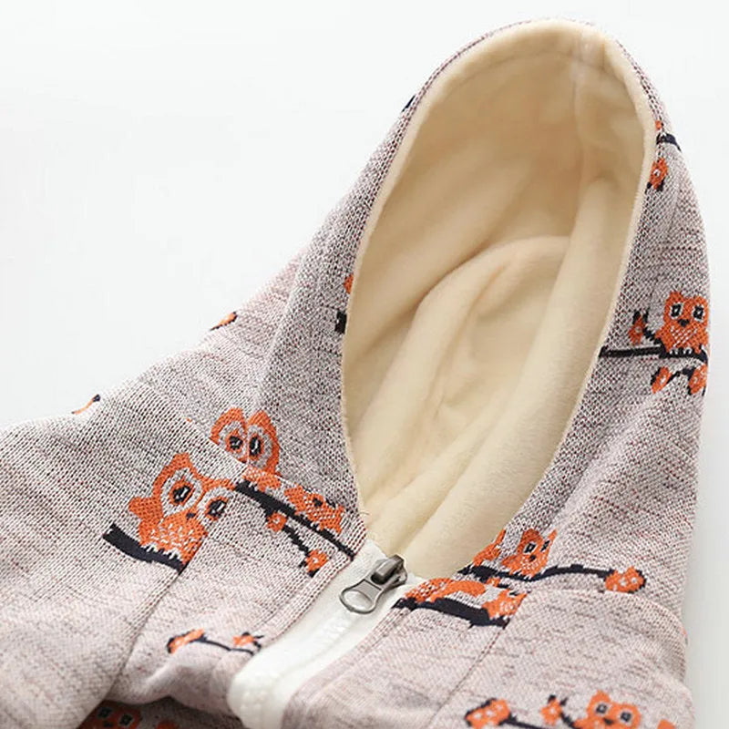 Blue cotton dog sweater with front zipper closure on small dog model