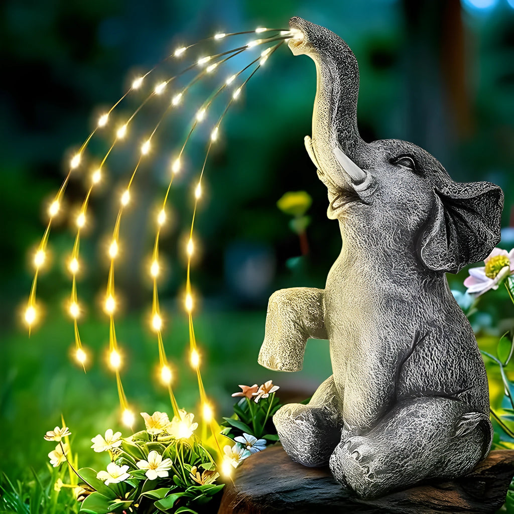 Resin elephant garden statue with LED string lights for outdoor patio decoration