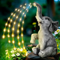 Resin elephant garden statue with LED string lights for outdoor patio decoration