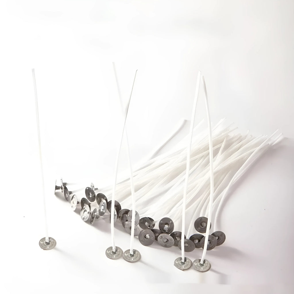 White cotton candle wick spool showing tightly woven core, with 2.6cm, 6cm and 8cm size examples.