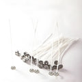 White cotton candle wick spool showing tightly woven core, with 2.6cm, 6cm and 8cm size examples.