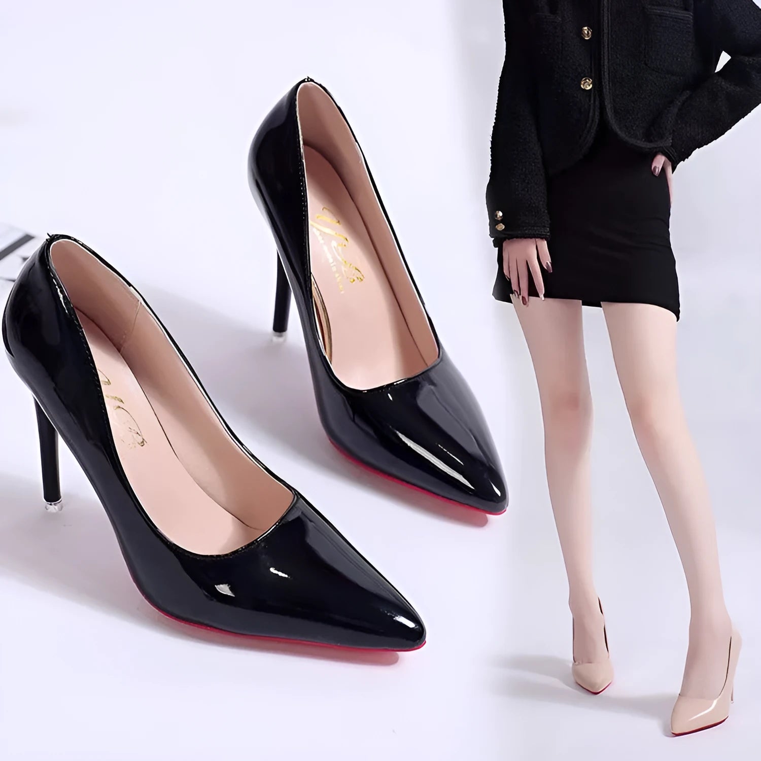 Women's solid colour pointed toe stiletto heel pumps on a white background.