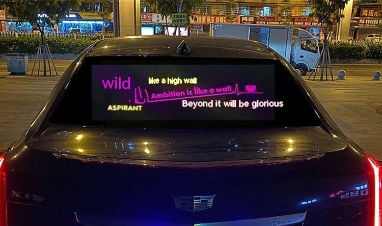 Car interior voice-controlled rhythm light displaying one of its 16 electroluminescent patterns on a 90 by 25 cm panel.