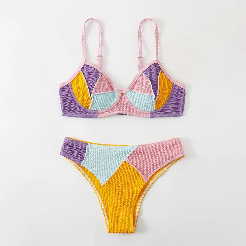 Women's spliced colour push-up bikini set with steel bracket support and matching shorts.