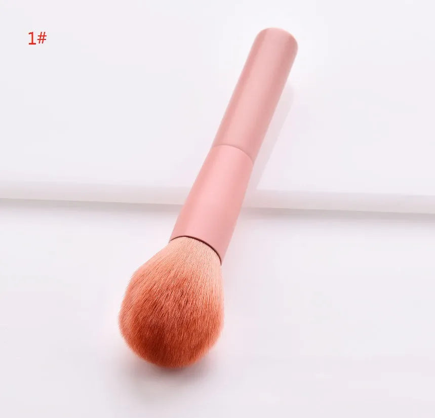 10-piece wooden handle makeup brush set with nylon bristles in a storage case.