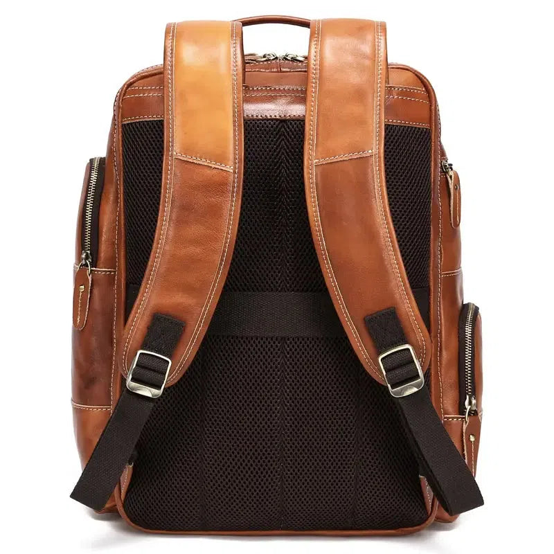 Bronze genuine leather backpack with zipper and structured shape for laptop storage