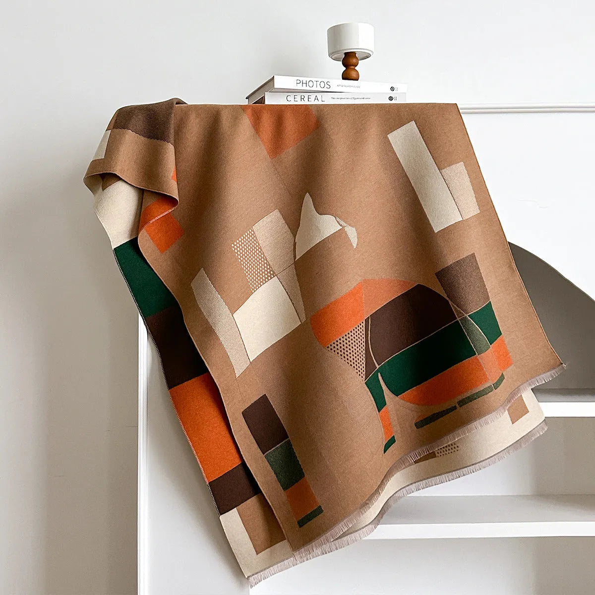 Long beige imitation cashmere scarf draped to show its 185cm length and texture.