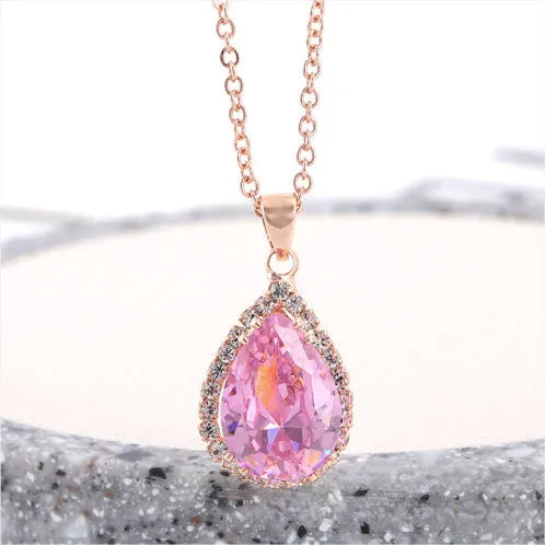 Drop shape geometric pendant necklace with rhinestone inlay in pink rose gold electroplated finish