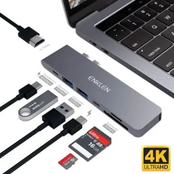 Silver aluminium USB-C 7-in-1 adapter hub with SD card slot, Micro SD slot, HDMI, USB 3.0, and USB-C ports