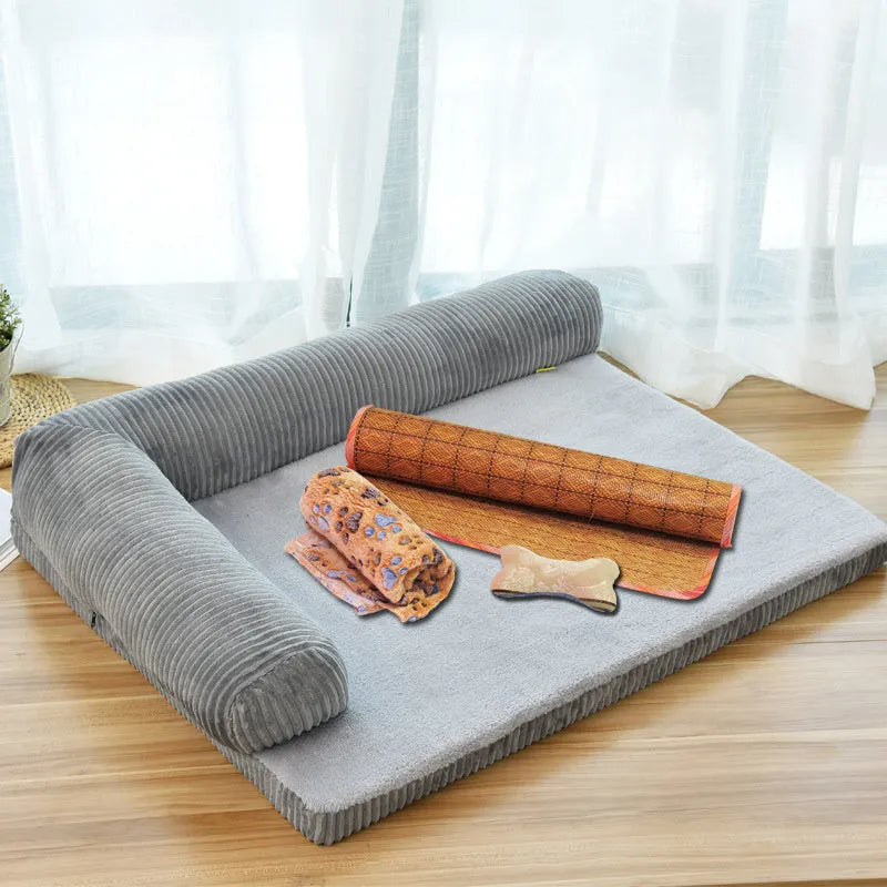 Corduroy fabric dog bed with bolster sides in a choice of coffee, grey, or red colours on a non-slip base.