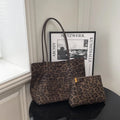 Leopard print polyester hand-held tote bag with double shoulder straps on a white background
