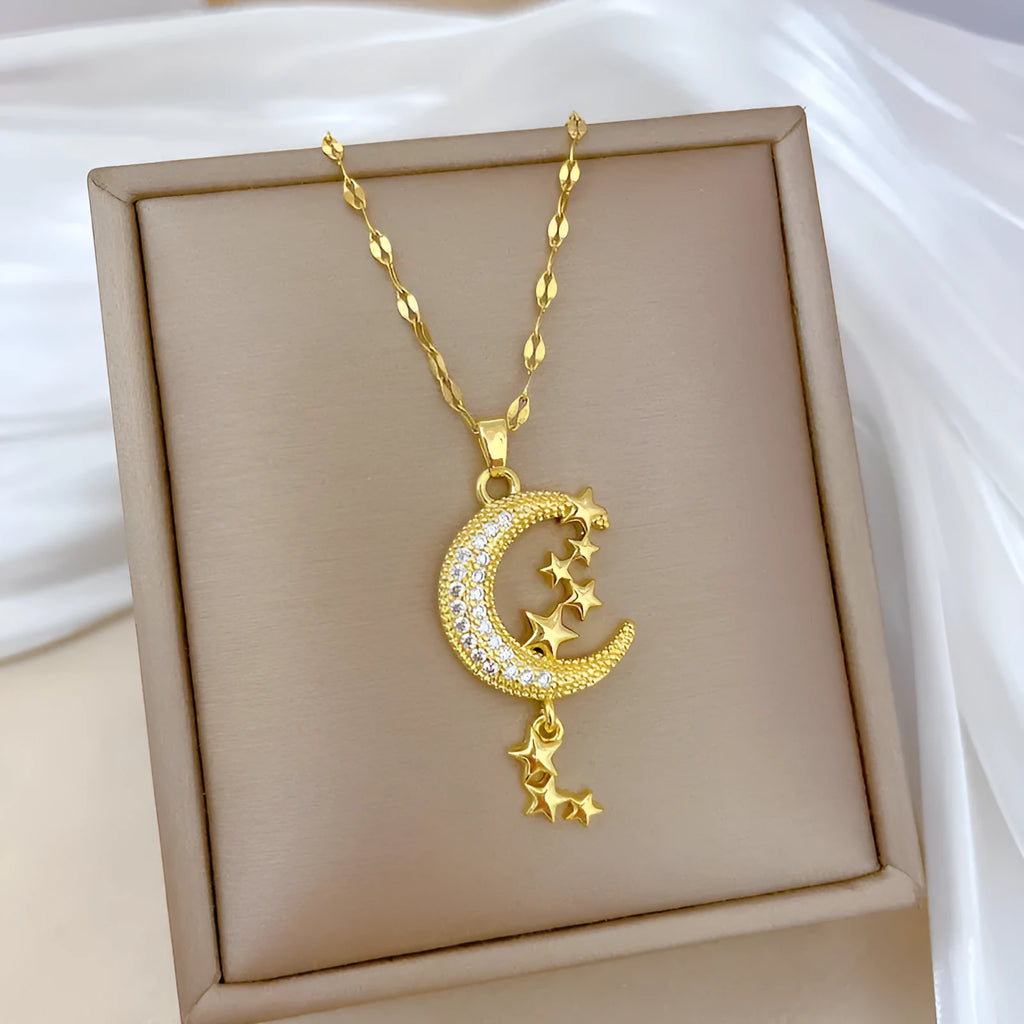 Moon tassel necklace with diamond elements on stainless steel chain and copper pendant