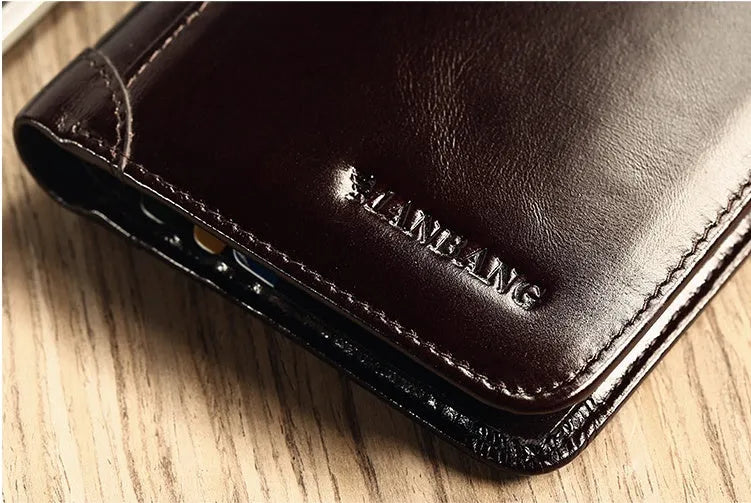 Men's black leather bifold wallet open to show internal card slots, photo window, coin pocket, and banknote compartment.
