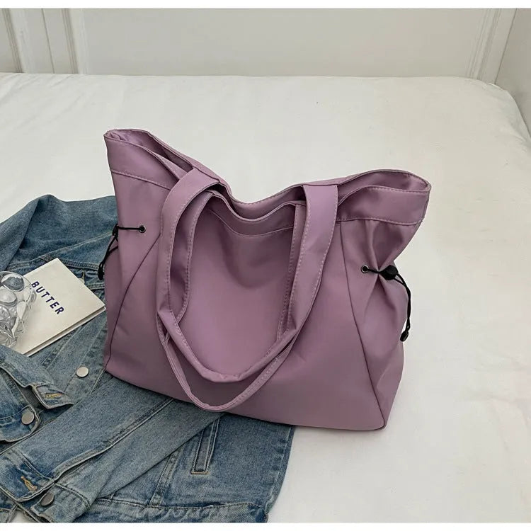 Soft Oxford cloth folding commuter tote bag in street style design showing colour options