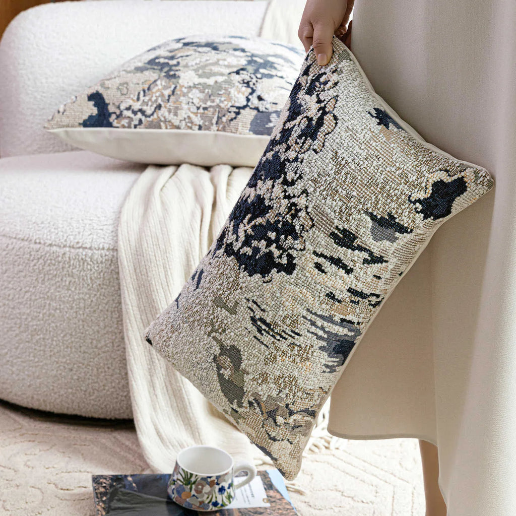 Antique blue floral patterned cushion in wool blend material showing French style design with feather velvet filler