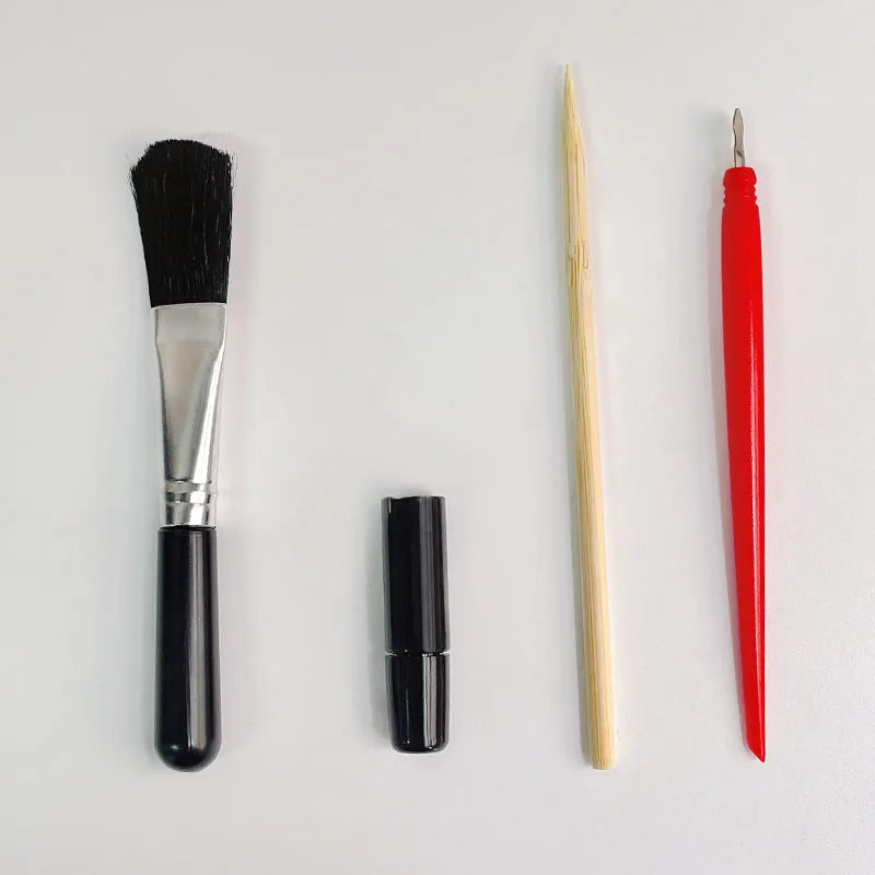 Scraping painting tool set with scratch pens, small scrapers, and white card paper for texture art