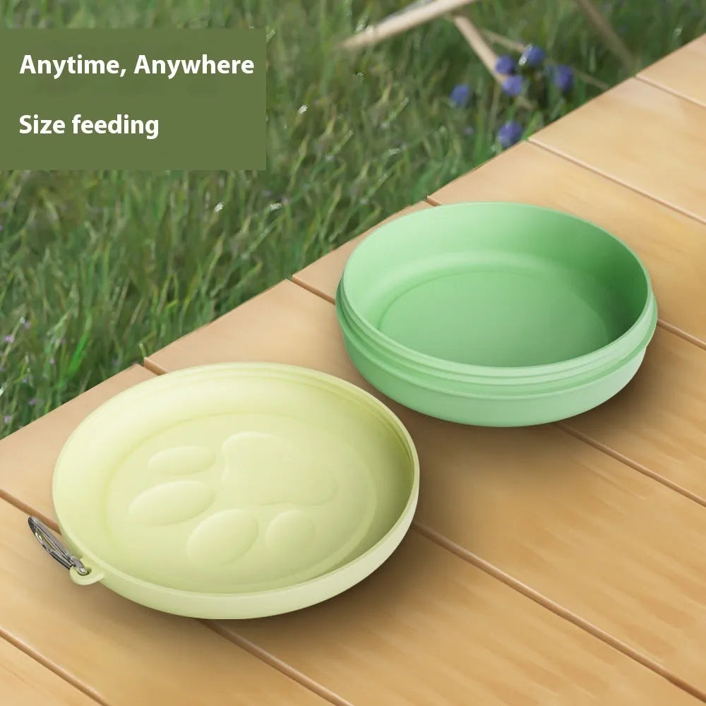 Collapsible silicone dog food and water bowl in pink and green colours, shown in both open and flattened positions