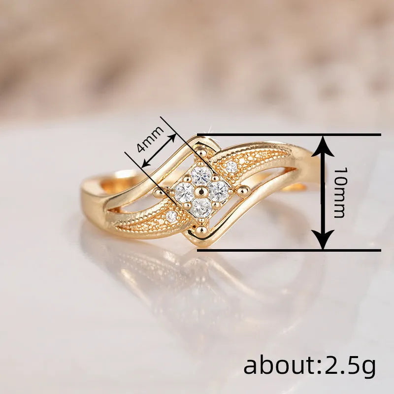 Women's yellow gold colour copper ring with diamond shape and micro inlaid zircon geometric design.