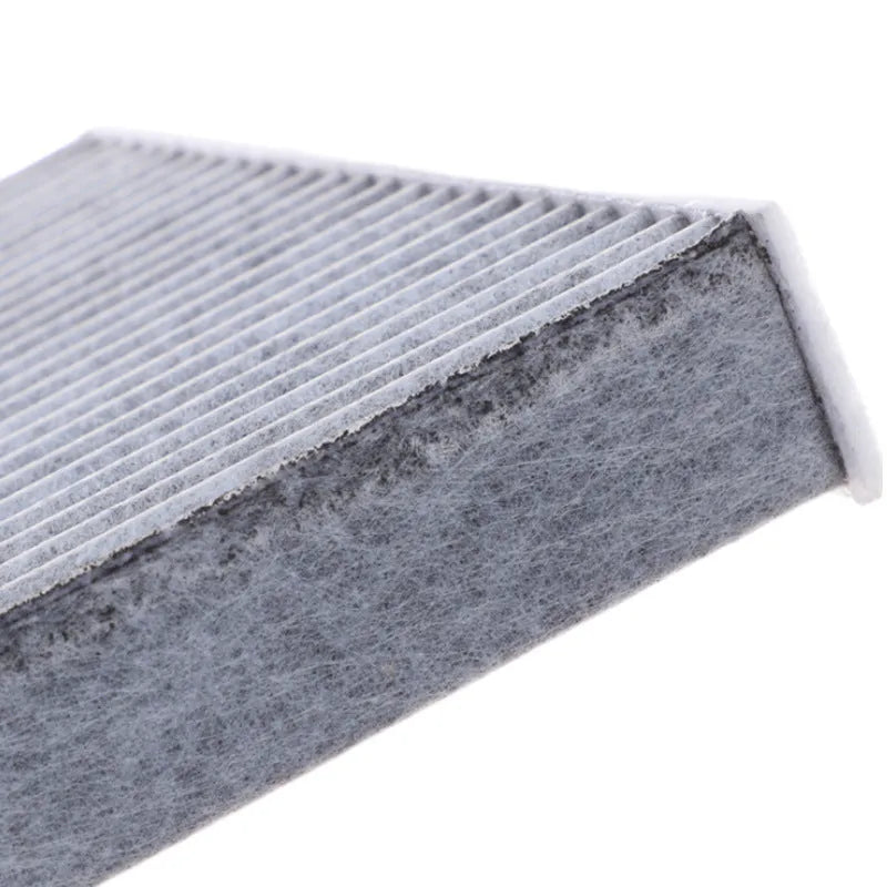 Grey Geely air conditioning filter element grid with 215x210x30mm dimensions for cabin air filtration