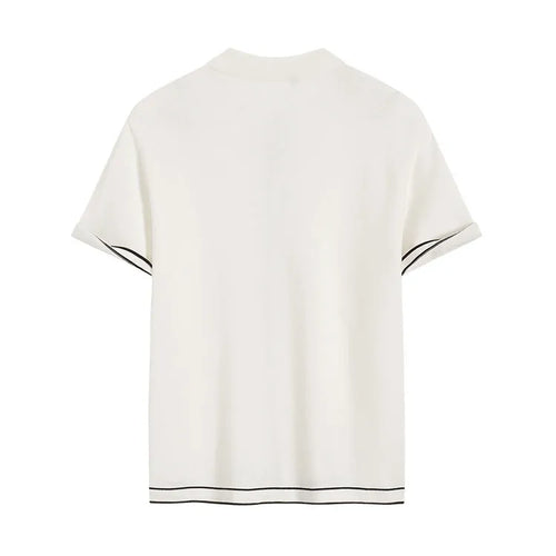 White short sleeve cardigan with contrasting colour lapels laid flat.