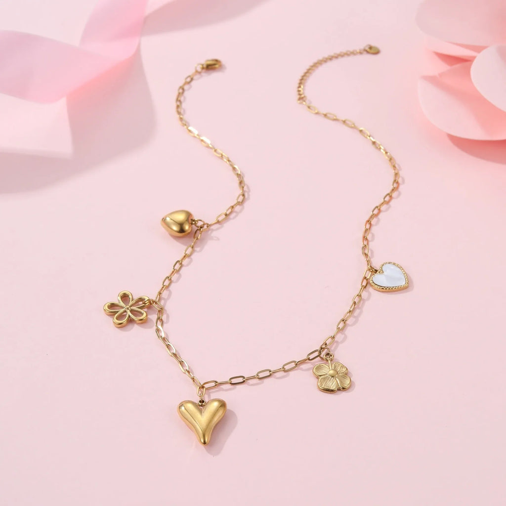 Women's stainless steel sun pendant necklace with adjustable chain and 18K gold electroplated finish