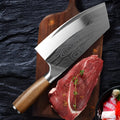 Stainless steel kitchen knife with a long 320mm blade on a cutting board