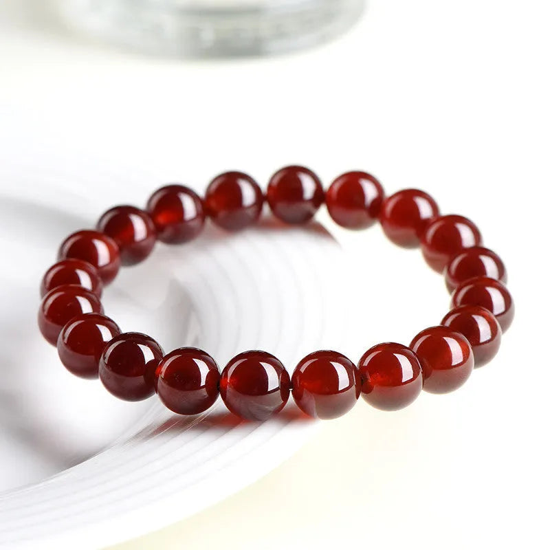 Natural orange red garnet ball crystal bracelet with Ruyi design elements in retro style