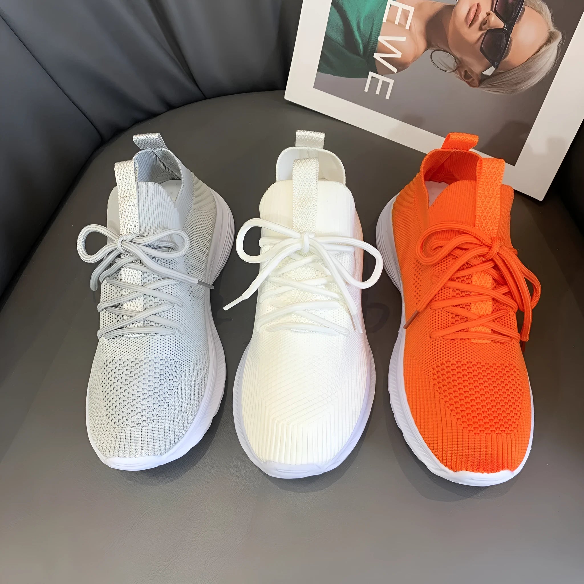 Women's mesh running shoes in creamy white with flyknit upper and English muffin heel detail